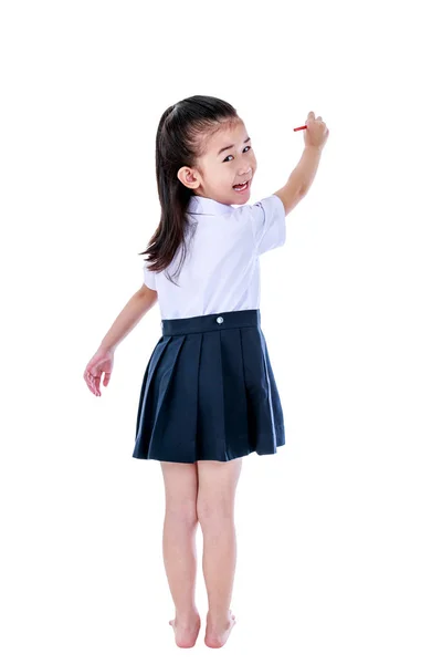 Asian girl laughing and holding red crayon. Isolated on white background. — Stock Photo, Image