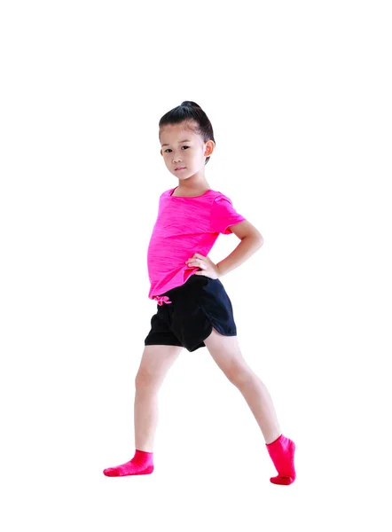 Asian pretty child doing exercises. Isolated on white background — Stock Photo, Image