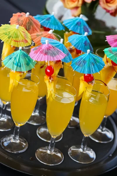 Cocktails with umbrellas at a spring festival corporate event