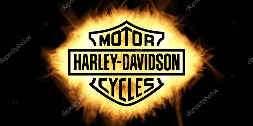 Cape Town, South Africa - January 1, 2020: Yellow Burning Flames Effect on Harley Davidson Icon Logo against black background