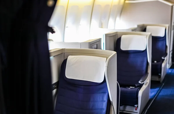 Interior view of Empty Airplane seats on board a luxury jet liner