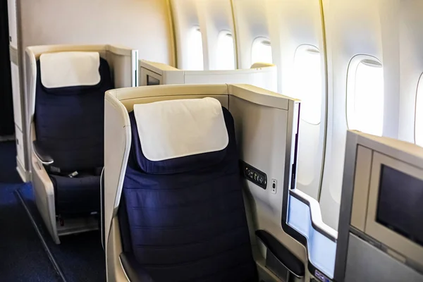 Interior view of Empty Airplane seats on board a luxury jet liner