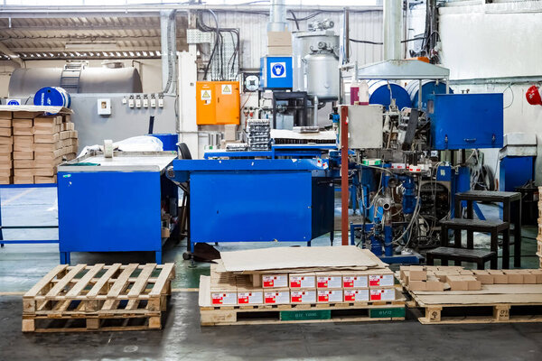 Johannesburg, South Africa - October 19, 2012: Machinery used on a glue and adhesives assembly line in a factory