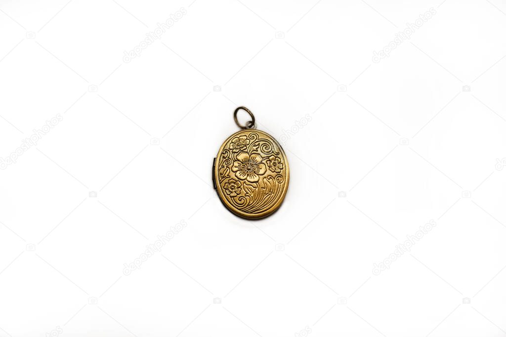 vintage grandma's bronze locket isolated on a white background