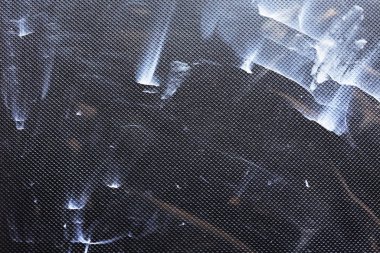 black textured background with splashes and stains