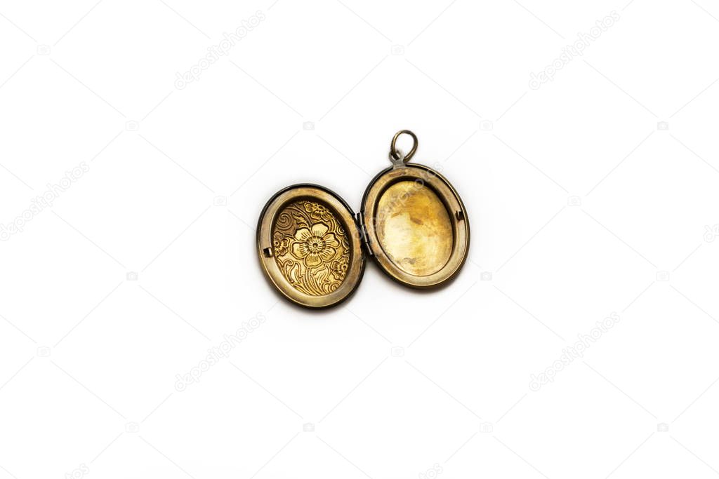 old grandma's bronze locket, retro style, isolated on a white background