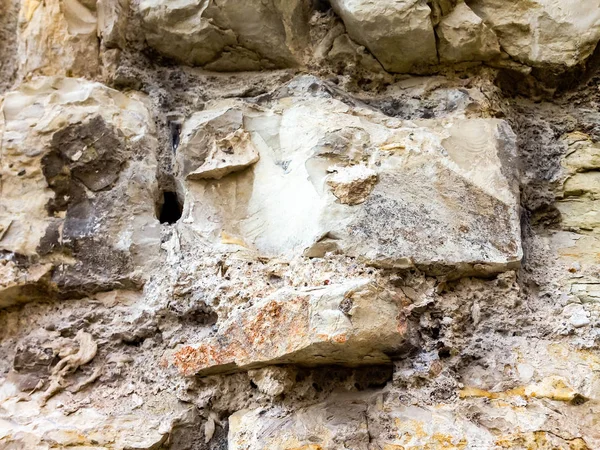 A wall of white stones