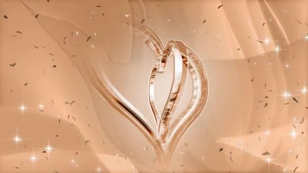 Abstract motion background featuring revolving metal hearts with golden sparkles on top — Stock Video