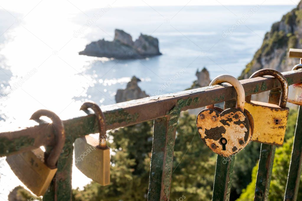 Rusty heart shaped lock with a view