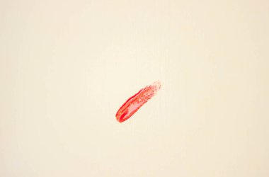 smears of red on special drawing paper