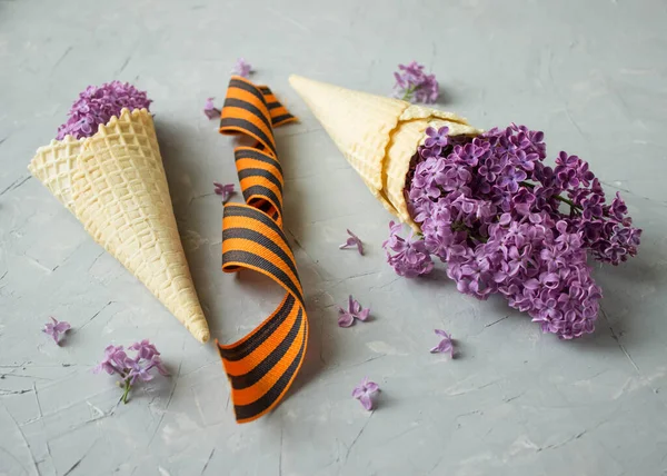 Waffle Ice Cream Cone Filled Lilac Flowers Concept May — Stock Photo, Image