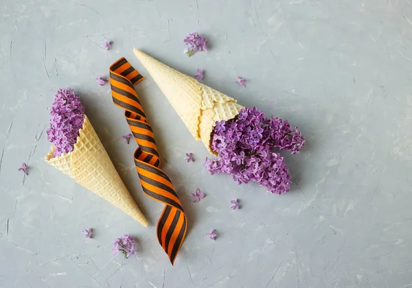 Waffle Ice Cream Cone Filled Lilac Flowers Concept May — Stock Photo, Image