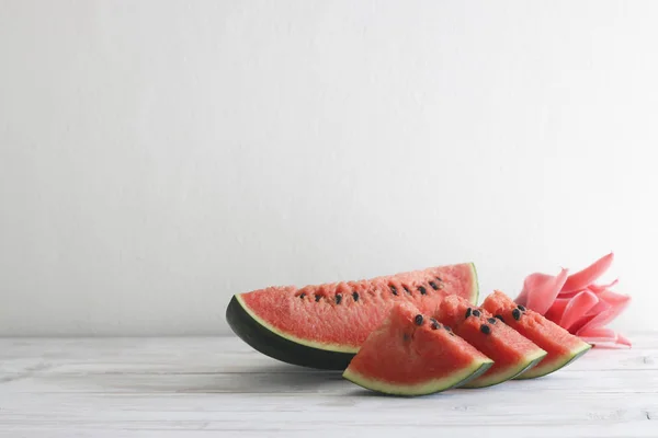 Stock Photo Fresh sliced watermelon wooden background — Stock Photo, Image