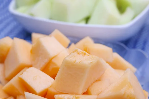 Stock Photo cantaloupe melon and green Organic Honeydew Melon Cut in a Bowl — Stock Photo, Image