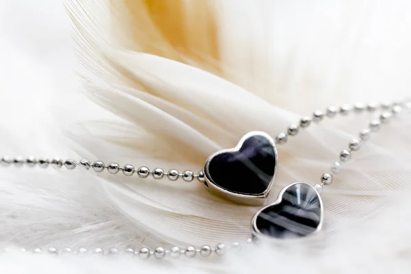 Heart shape black diamond Necklace on feathe — Stock Photo, Image