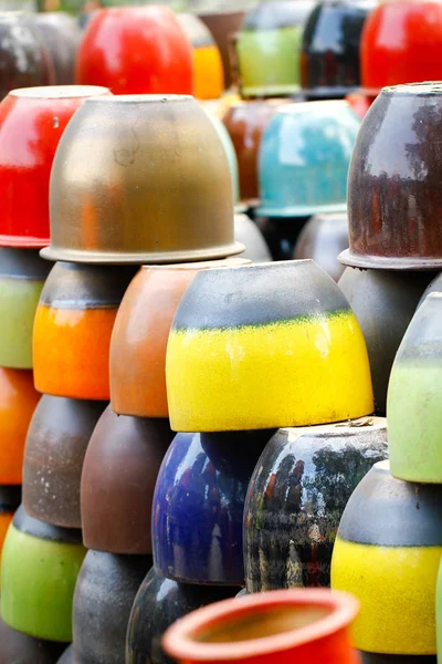 Lots of ceramic jars in different colors hand made parts — Stock Photo, Image