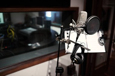 Modern microphone in recording studio