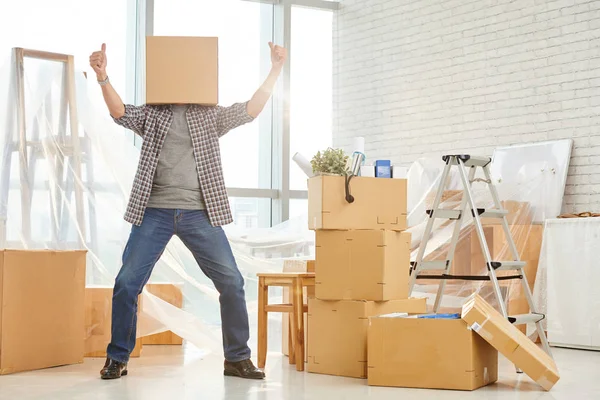 Man with cardboard box on head — Stock Photo, Image