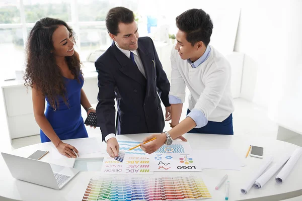 Designers choosing color scheme