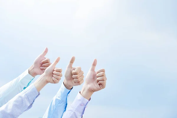 Hands of people showing thumbs up — Stock Photo, Image
