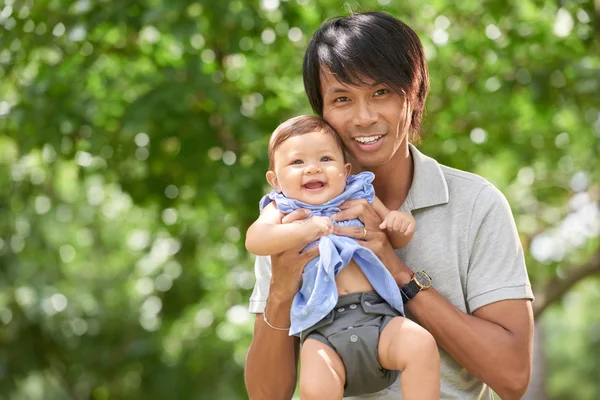 Father holding adorable girl — Stock Photo, Image