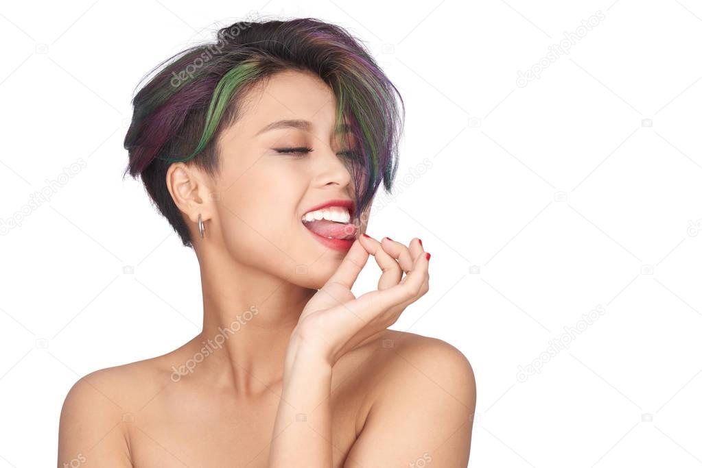 Asian woman playing with hair