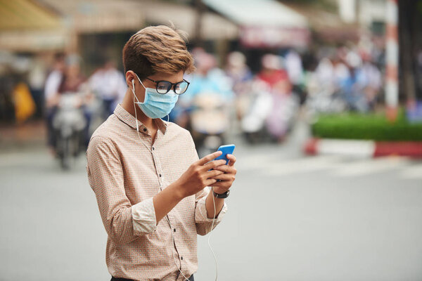 Asian man in medical mask