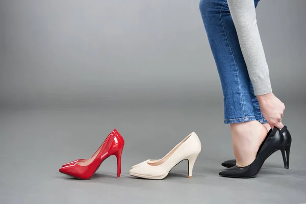 Woman choosing heels — Stock Photo, Image