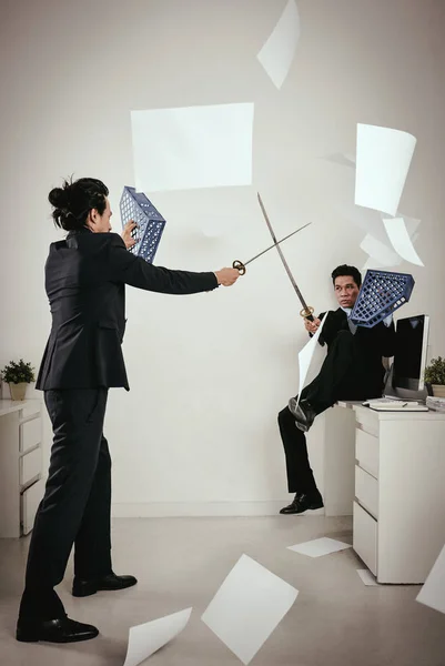 Business people fighting in office