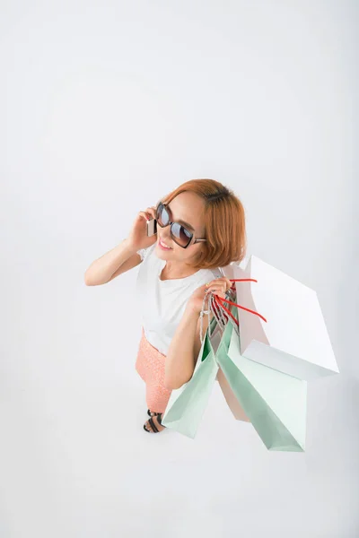 Young woman with paper bags — Stock Photo, Image