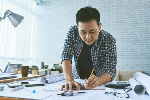 Architect concentrated on work