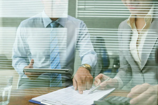 Business people looking on papers — Stock Photo, Image