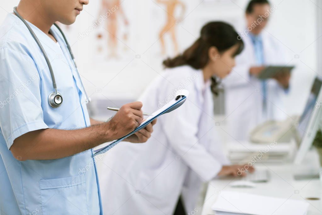 Group of doctors in hospital room