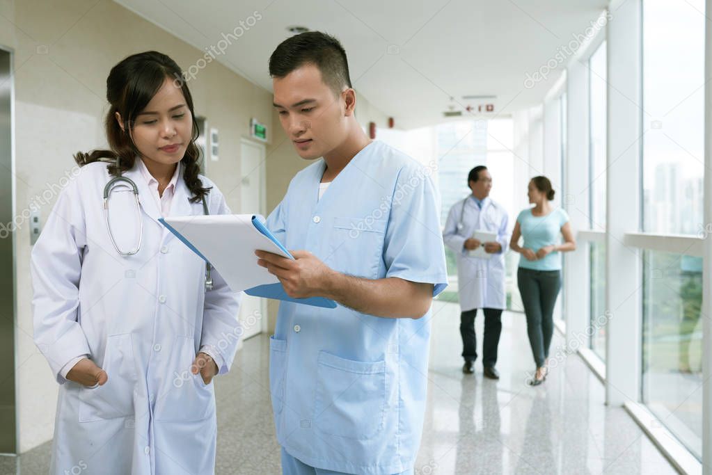 doctor examining patient