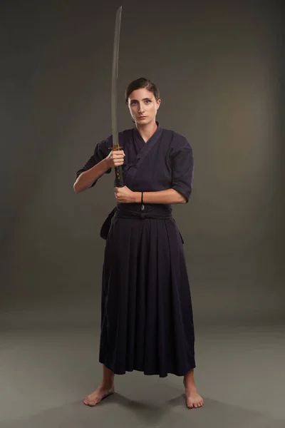 Woman with samurai sword — Stock Photo, Image