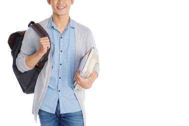 Üniversite öğrencisi el karşı beyaz arka plan ayakta ders kitapları yığını ile kısmi görünümünü