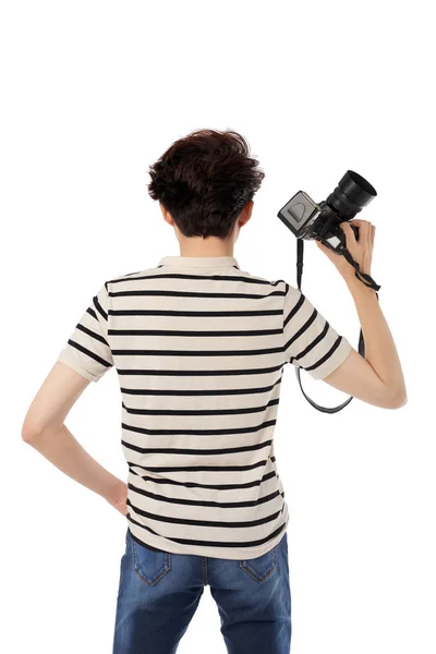 白で隔離 カメラを持つカメラマンの背面図 — ストック写真