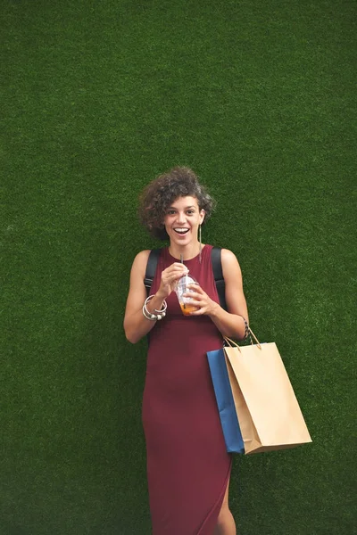 Happy Woman Drink Paper Bags Agains Green Background — Stock Photo, Image