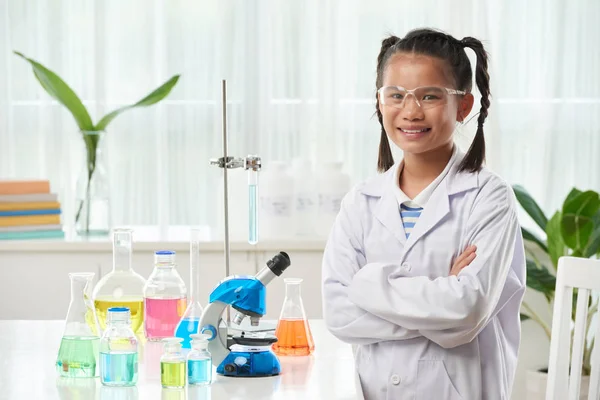 Portrait Cheerful Schoolgirl Standing Table Different Chemical Glassware — Stock Photo, Image