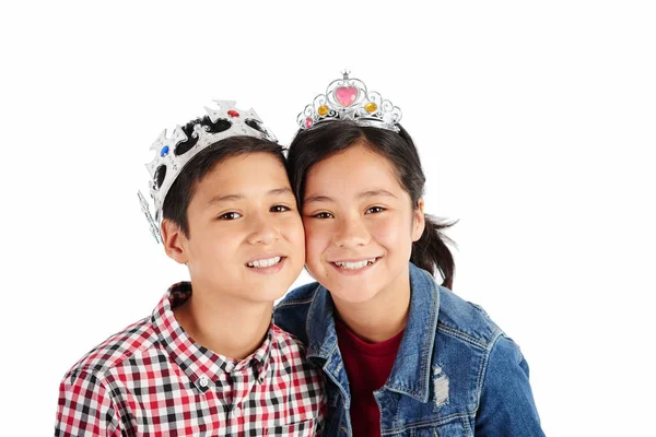 Portrait Cheerful Asian Twins Plastic Crowns Looking Camera — Stock Photo, Image