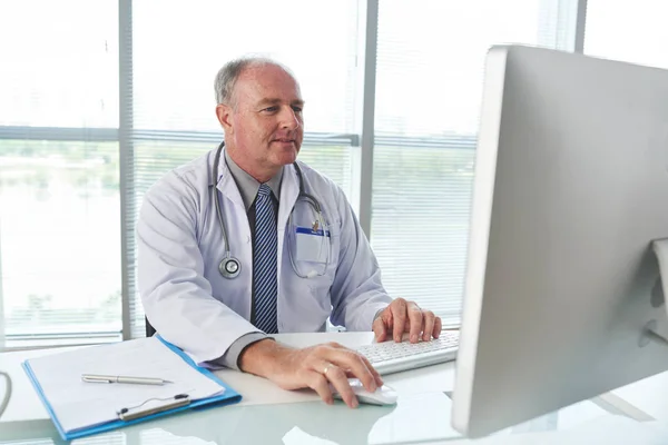 Senior Doctor Working Computer His Office — Stock Photo, Image