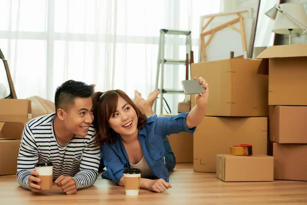 Beautiful Young Asian Couple Lying Floor Room Carton Boxes Taking — Stock Photo, Image