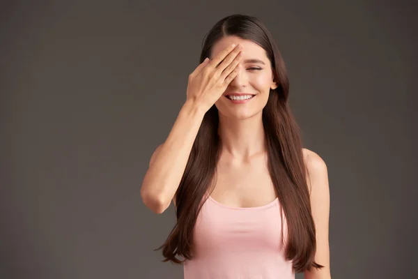 Smiling Young Woman Covering Face Hand Show Embarrassment — Stock Photo, Image