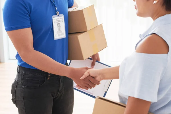 Fast Delivery Service Representative Shaking Hand Female Client — Stock Photo, Image
