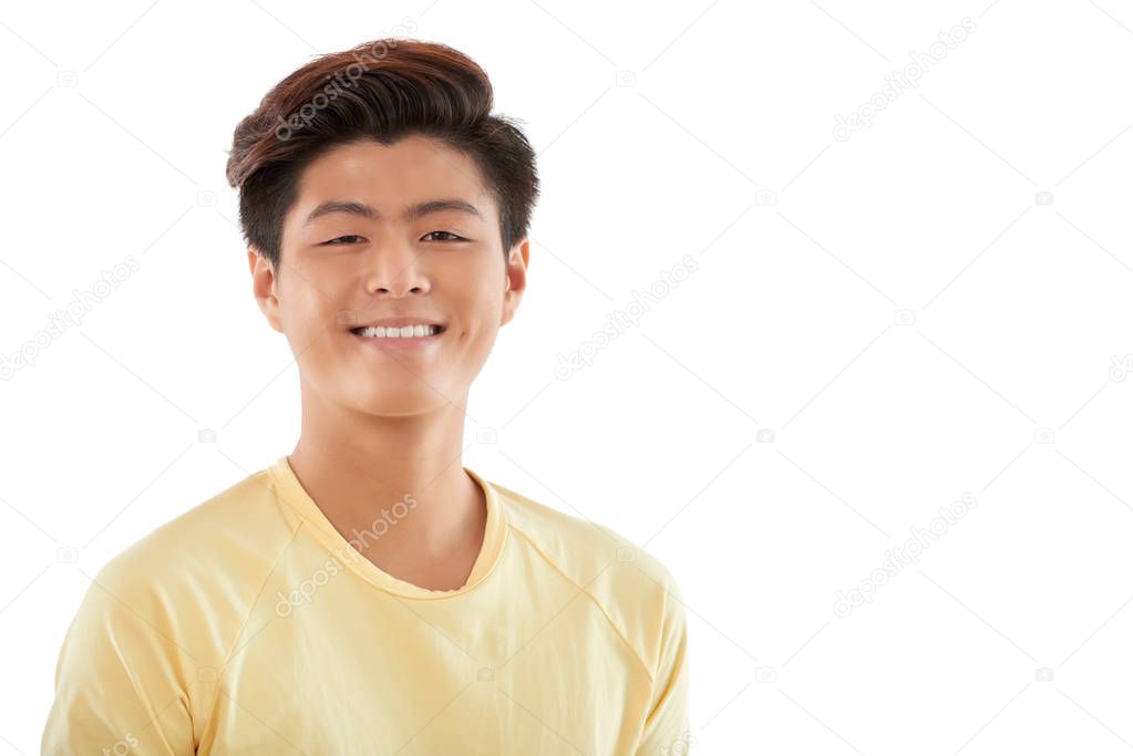 Portrait of happy Vietnamese young man, isolated on white