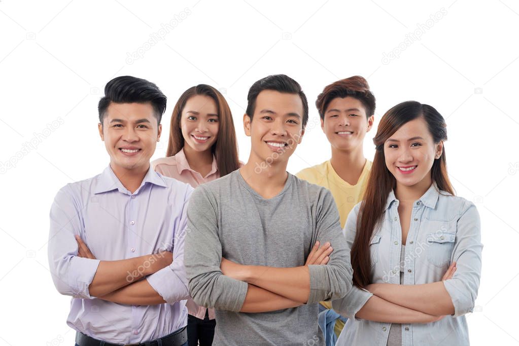Confident young business people smiling and looking at camera