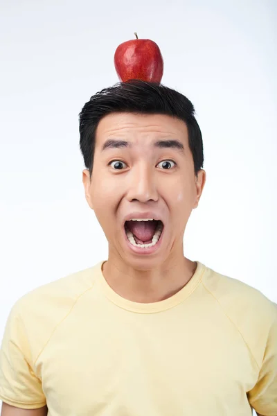 Scared Asian Man Red Apple Head Looking Camera Shouting Top — Stock Photo, Image