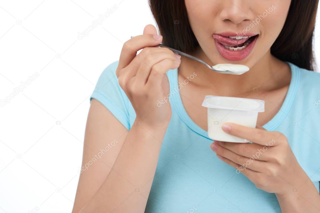Eating Appetizing Yogurt