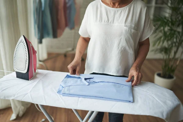 Hands Woman Folding Blue Shirt Ironing — Stock Photo, Image