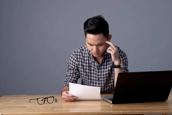 Concentrated Asian Manager Doing Paperwork While Sitting Office Desk Laptop — Stock Photo, Image